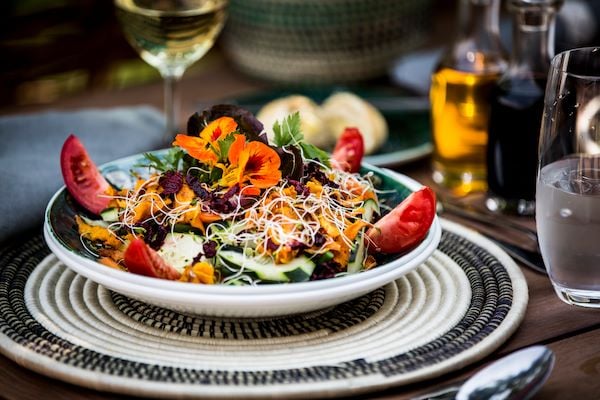 Luxury sustainable dining experience with organic garden produce at Bisate Lodge