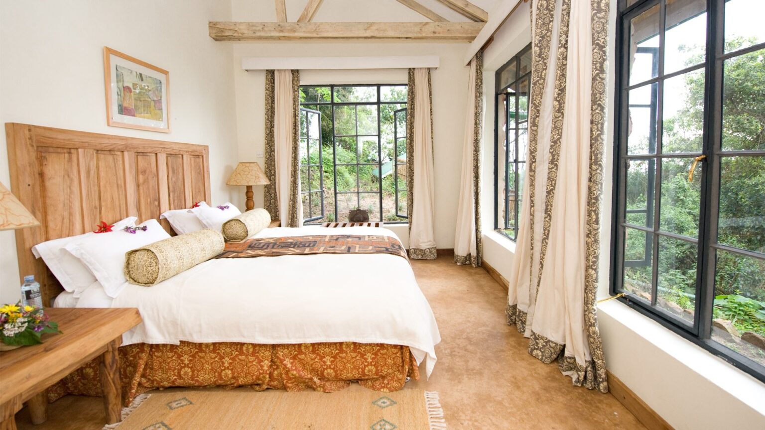 Luxury cottage interior at Clouds Mountain Gorilla Lodge overlooking Bwindi Impenetrable Forest