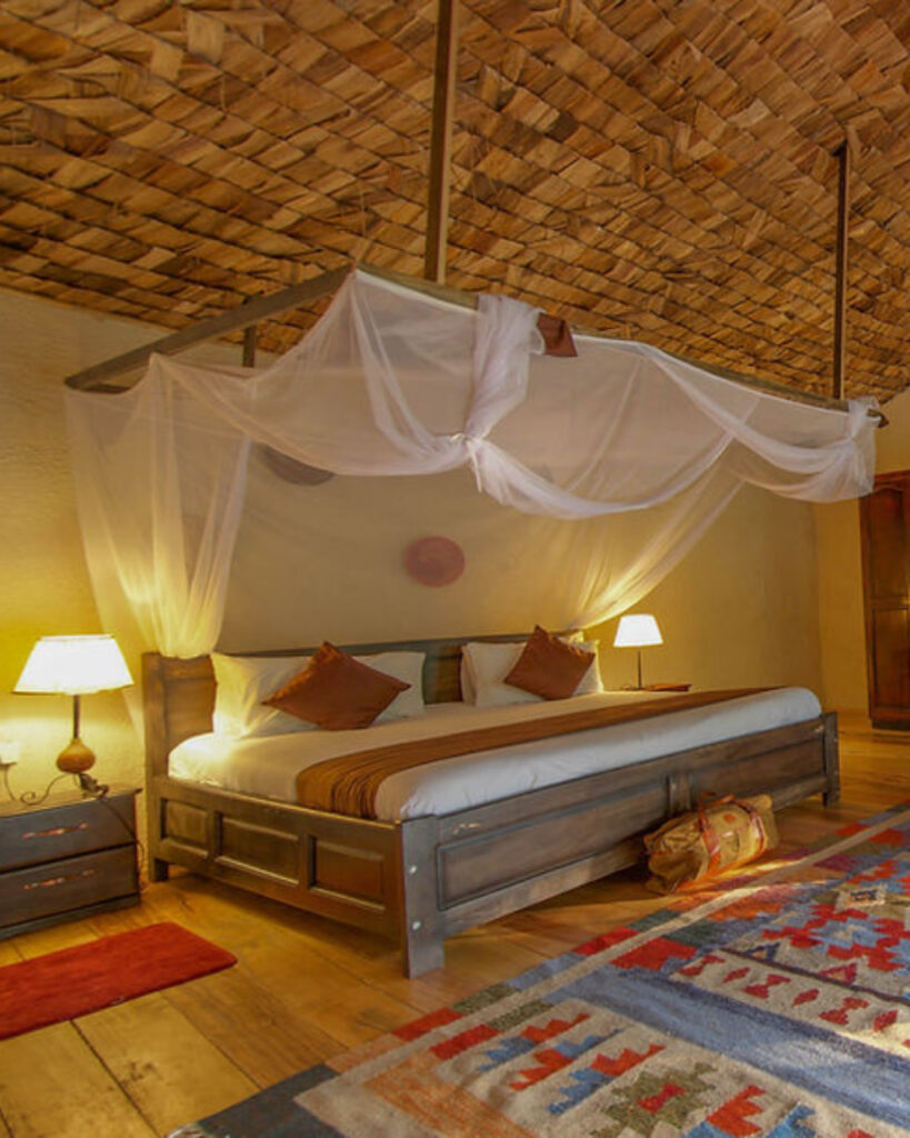 Elegant suite at Mahogany Springs Lodge overlooking Bwindi National Park