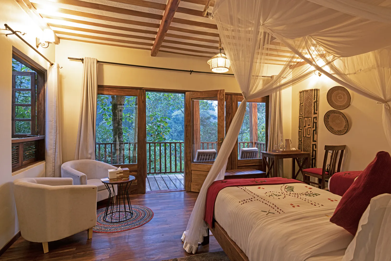 Private luxury cottage bedroom at a gorilla safari lodge