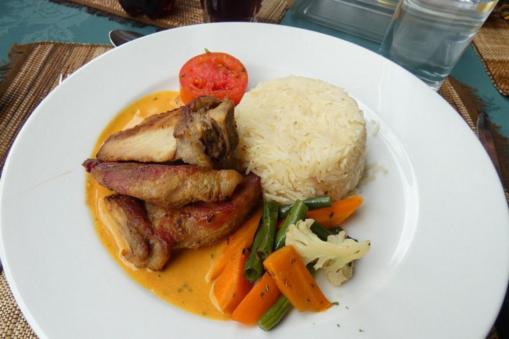Authentic Ugandan-inspired fine dining dish at Mahogany Springs Lodge