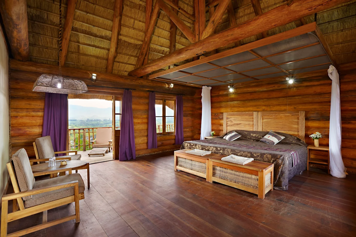 Luxury room at Kyaninga Lodge overlooking crater lake in Kibale Forest