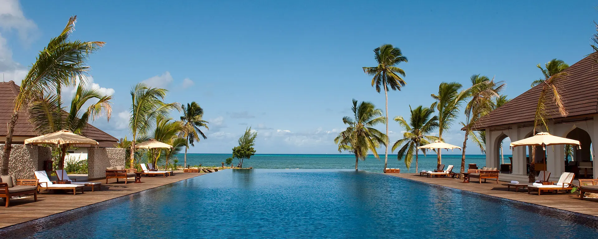 The Residence Zanzibar provides elegant private villas with swimming pools, beachfront access, spa treatments, gourmet dining, and exceptional service. The resort is highly popular among luxury honeymooners 