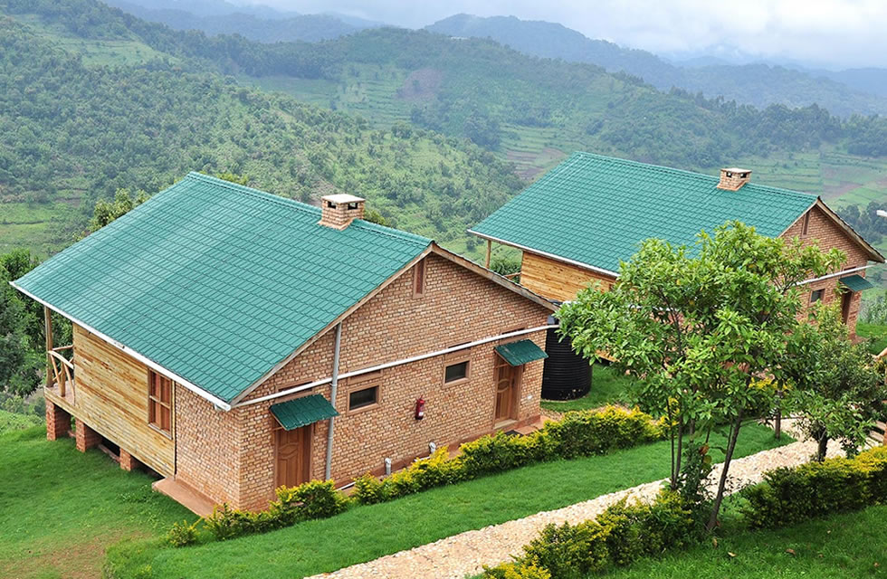 Ruhija Gorilla Safari Lodge provides luxury comfort with spacious cottages, panoramic forest scenery, and easy access to gorilla trekking activities. The lodge is surrounded by beautiful rainforest vegetation and offers private balconies where travelers can enjoy sunrise views and cool mountain air. Luxury travelers appreciate the